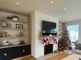 White painted fireplace in living room